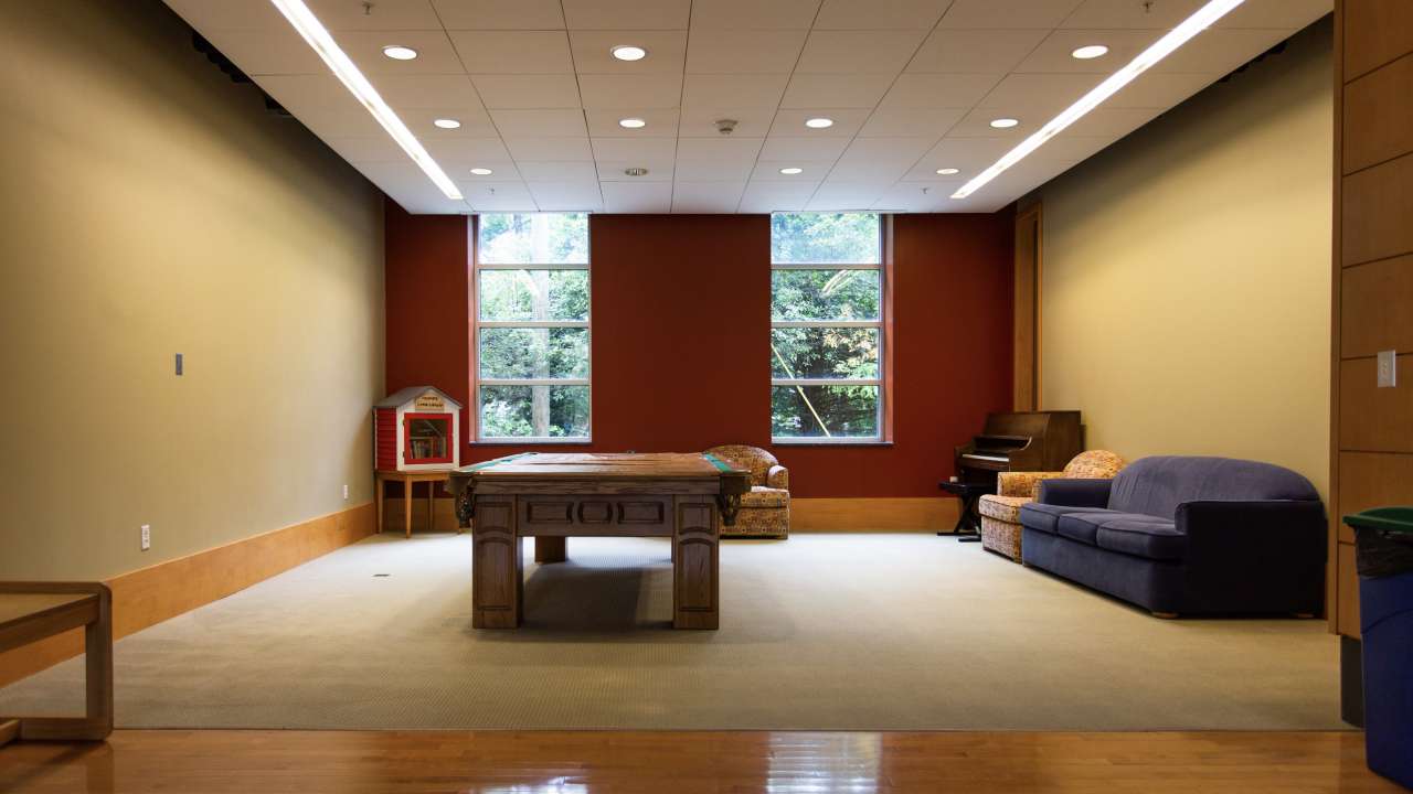 Common area with pool table and piano