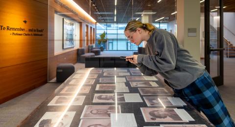 A Keene State HGS student studying materials